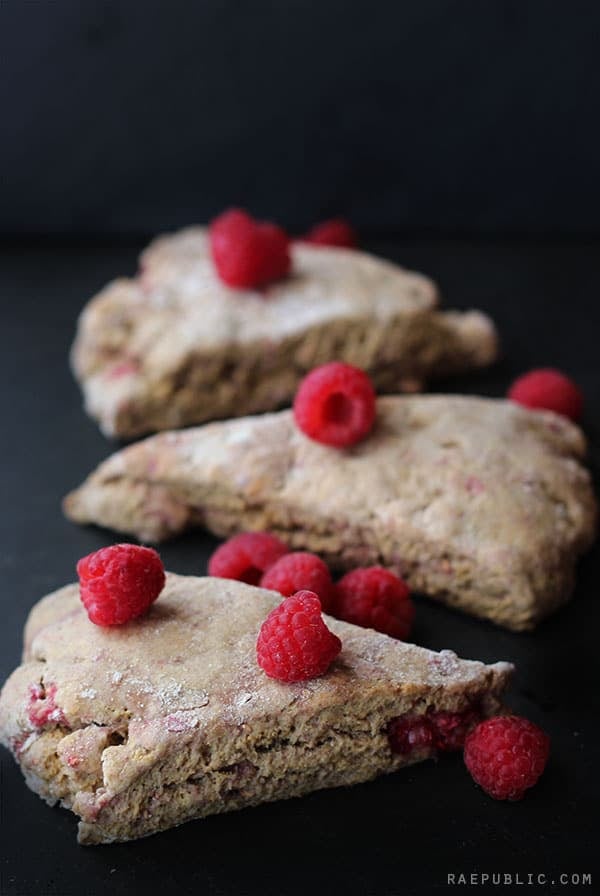 Raspberry scones on a black background.