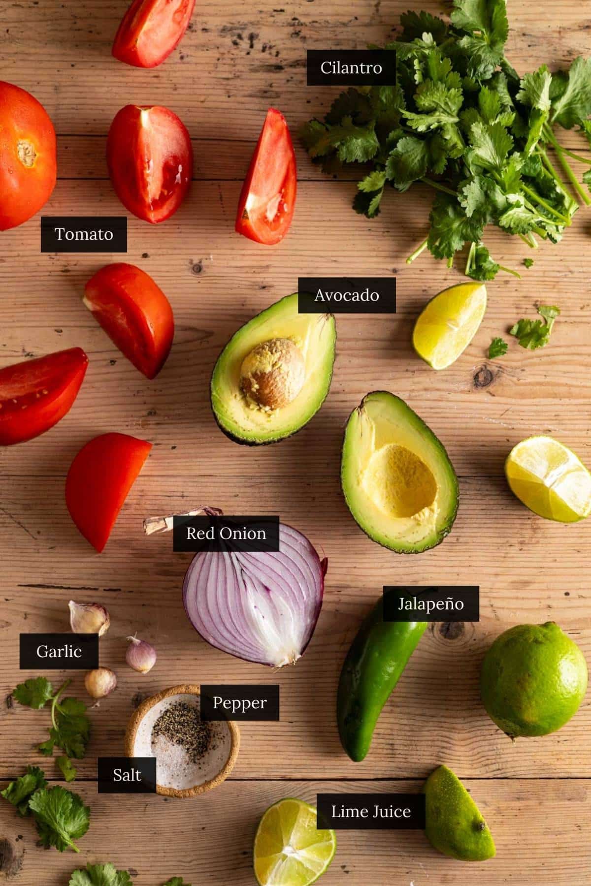 Ingredients for homemade pico de gallo with avocado labeled.