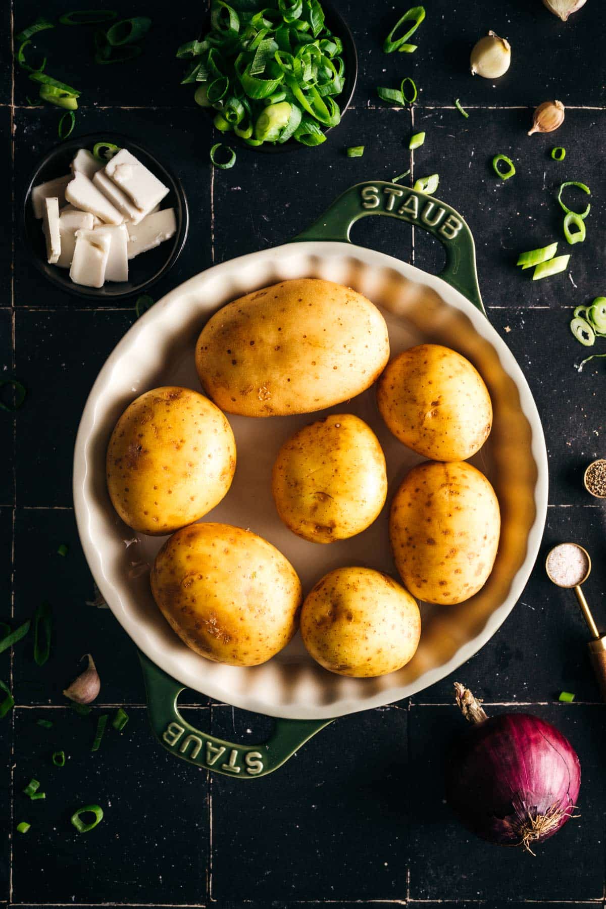 Preparing gold potatoes to be microwaved.