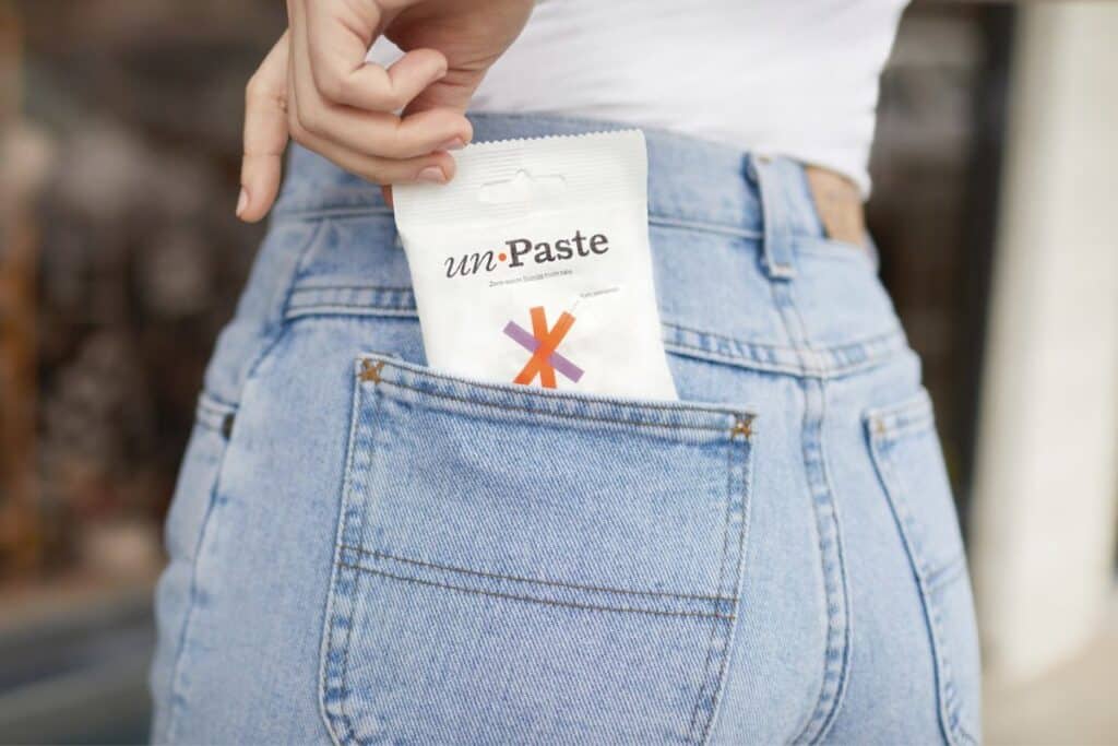 White bag of plastic-free toothpaste tablets.