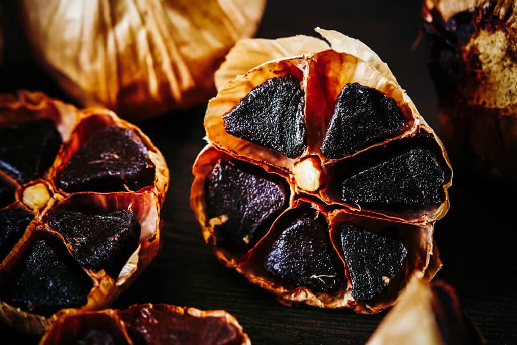 Black garlic close up of the cloves.