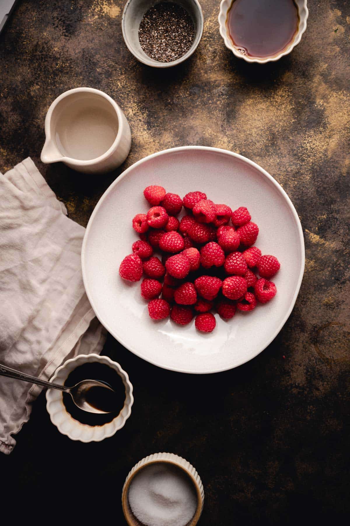 Raspberries in a shallow bowl.