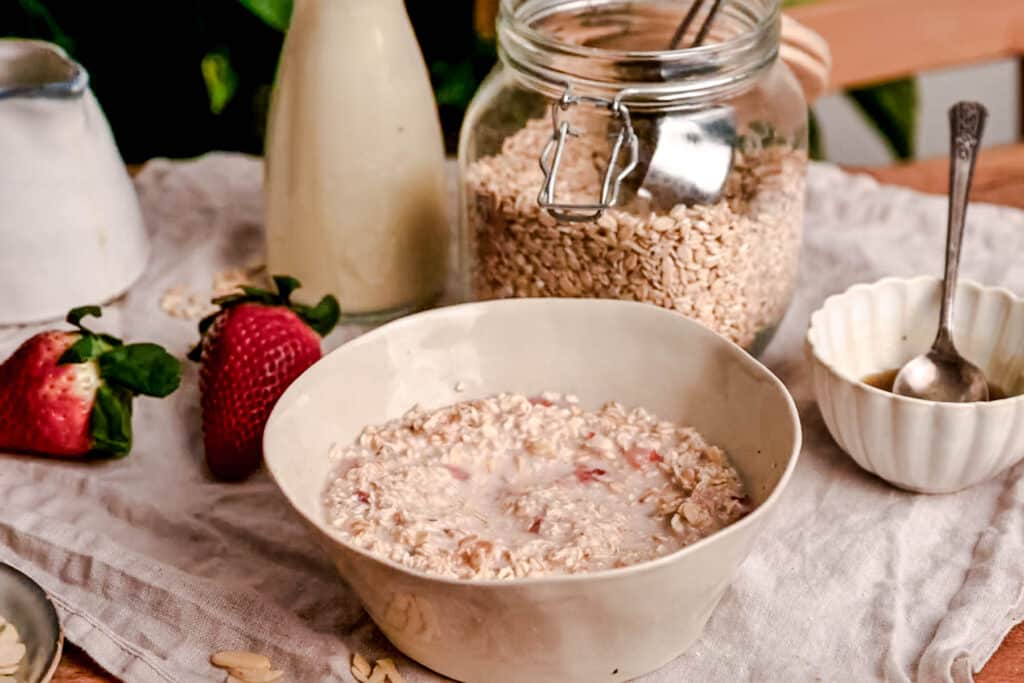 Oatmeal with strawberries soaking up the hot dairy-free milk.