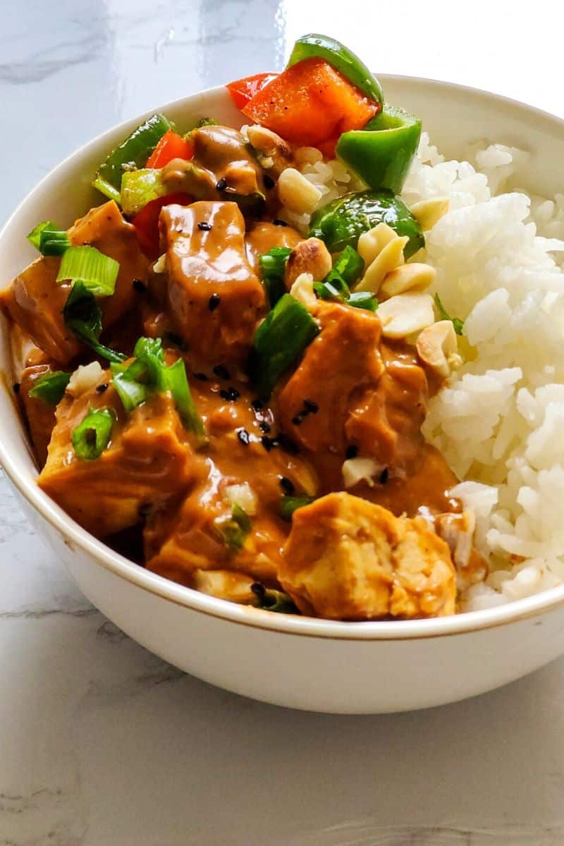 A bowl of tofu with vegetables in it.(Vegan, tofu)