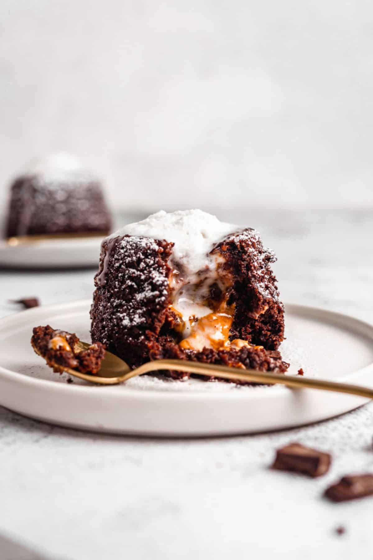 Personal sized biscoff lava cake drenched in chocolate.