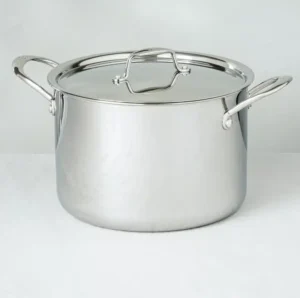 A stainless steel pot with a lid and two handles.