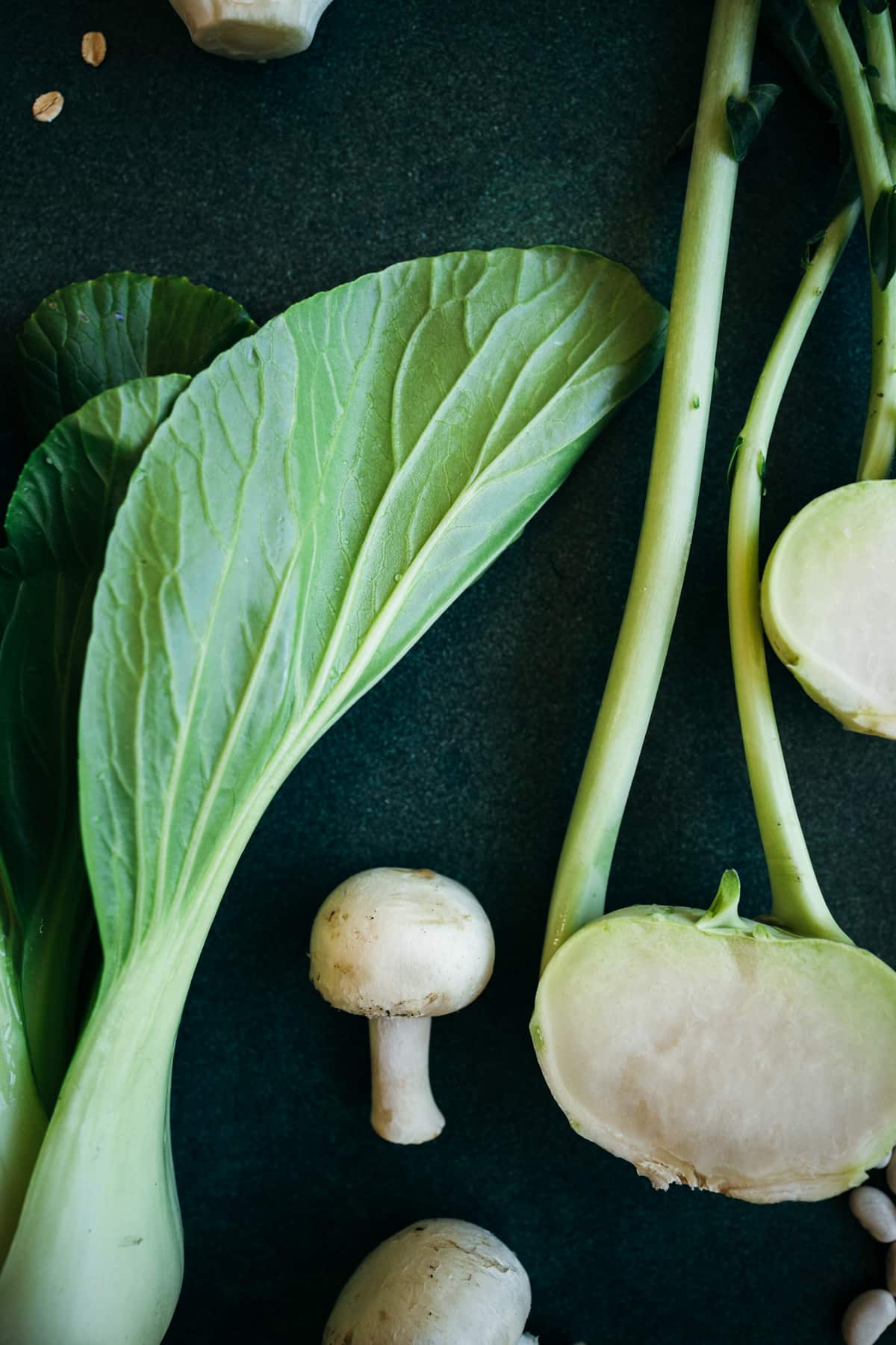 White and green bock choy, white mushrooms, and kohlrabi.