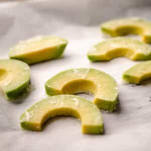 Close up of frozen avocado slices.