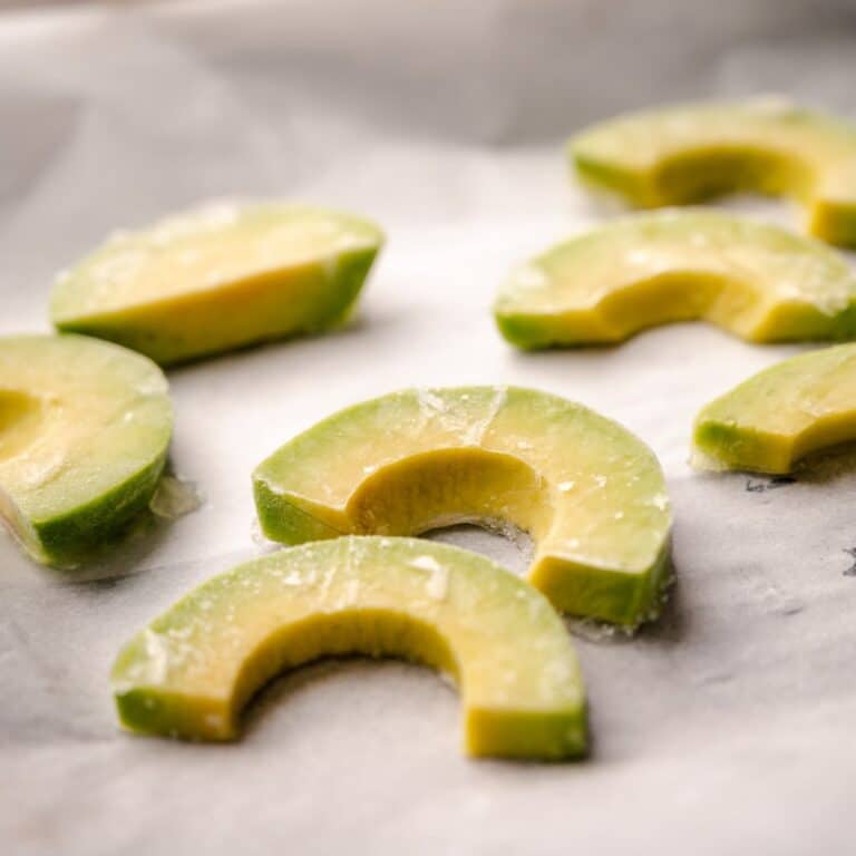Close up of frozen avocado slices.