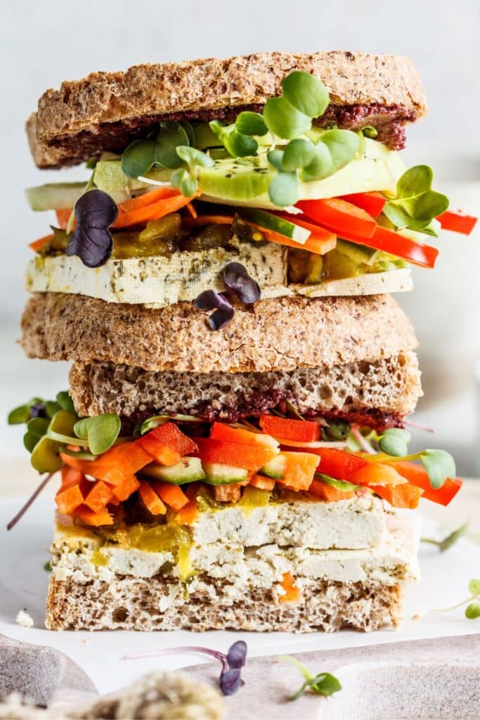 A sandwich is stacked on top of another sandwich.