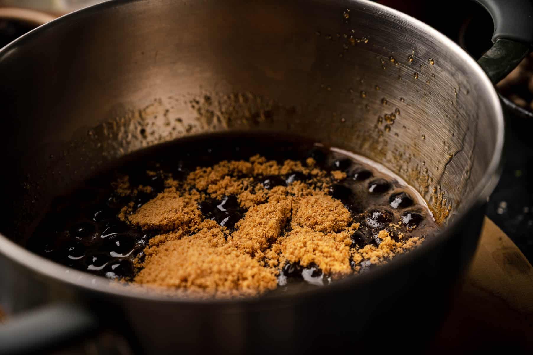Brown sugar and tapioca balls simmering in a pot.
