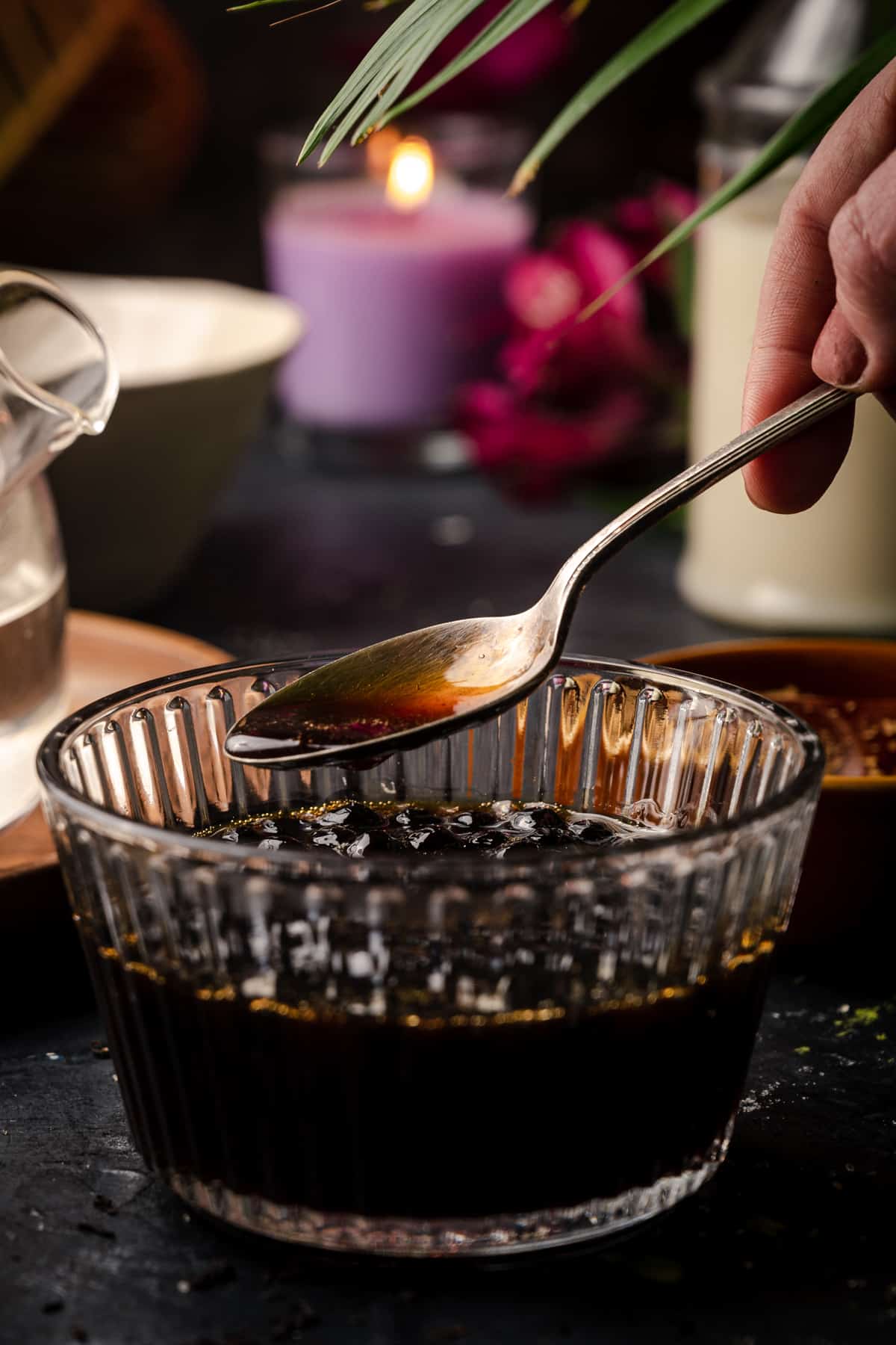 Glass bowl of brown sugar boba syrup.