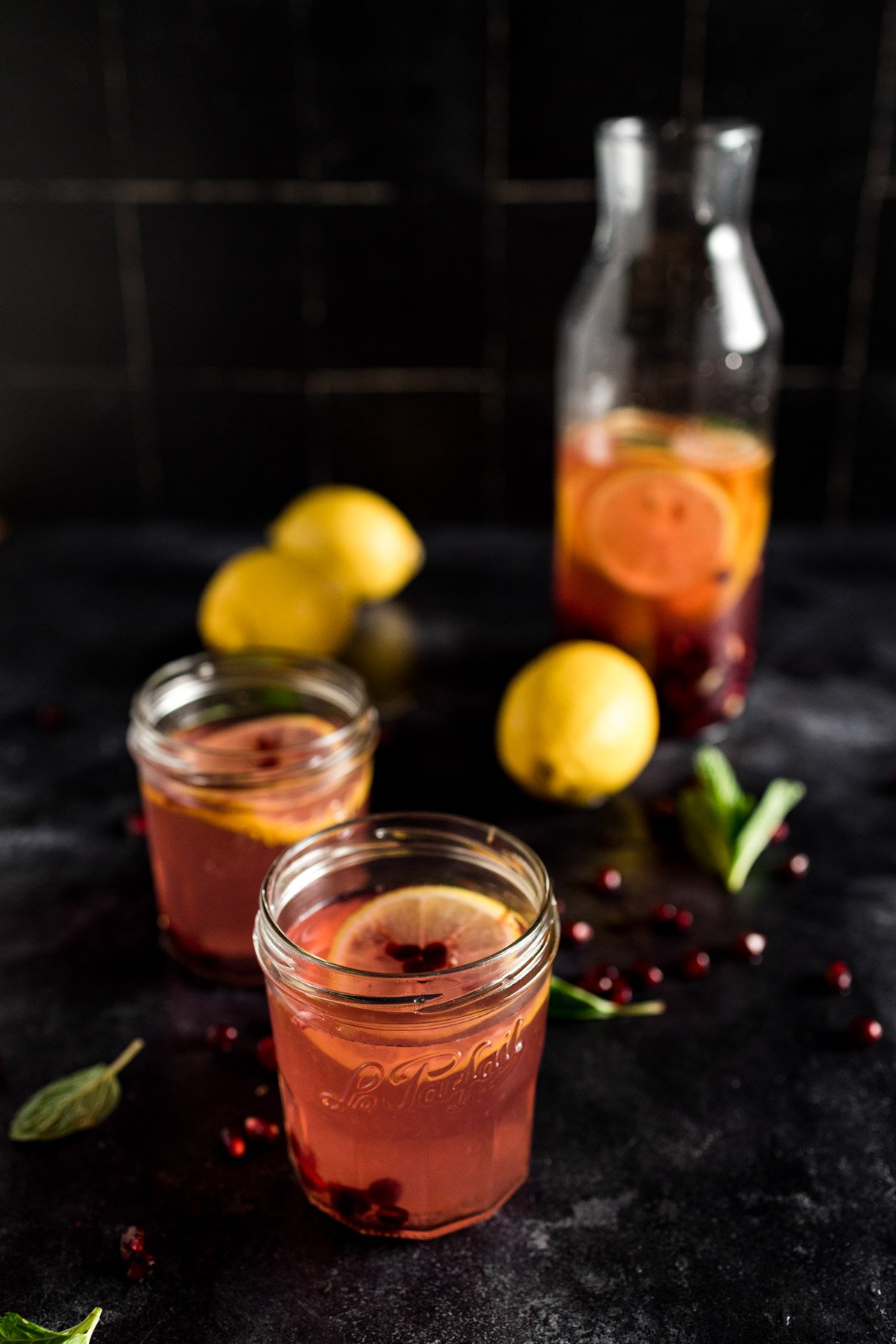 Pomegranate lemonade with pomegranate seeds.