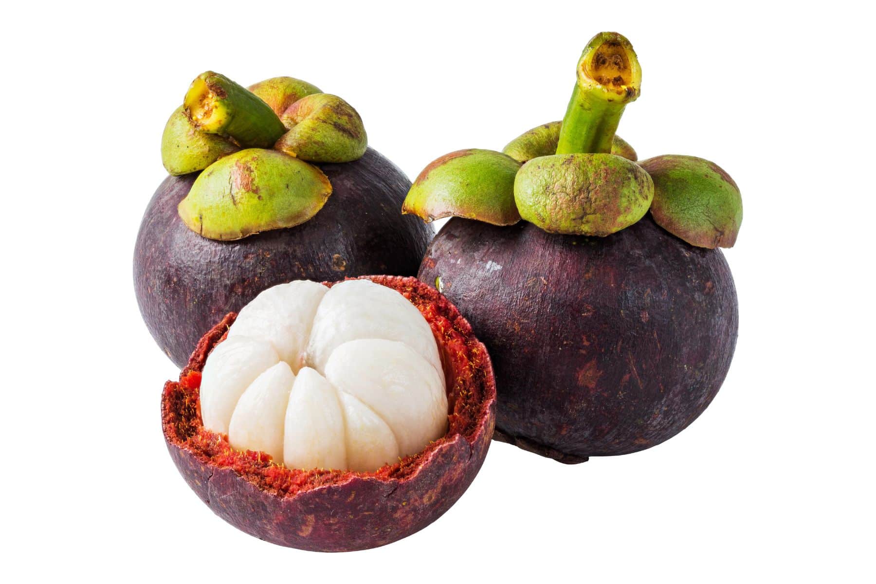 Three mangosteens are shown, with one cut open to reveal its white segmented flesh.