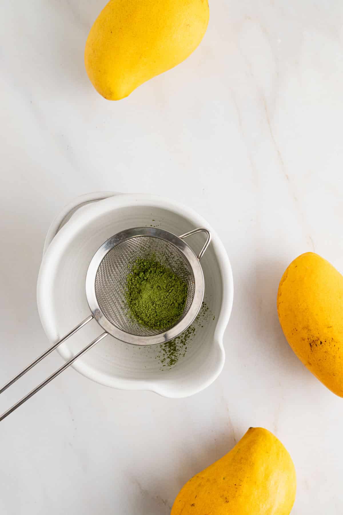 Sifting ceremonial grade matcha.
