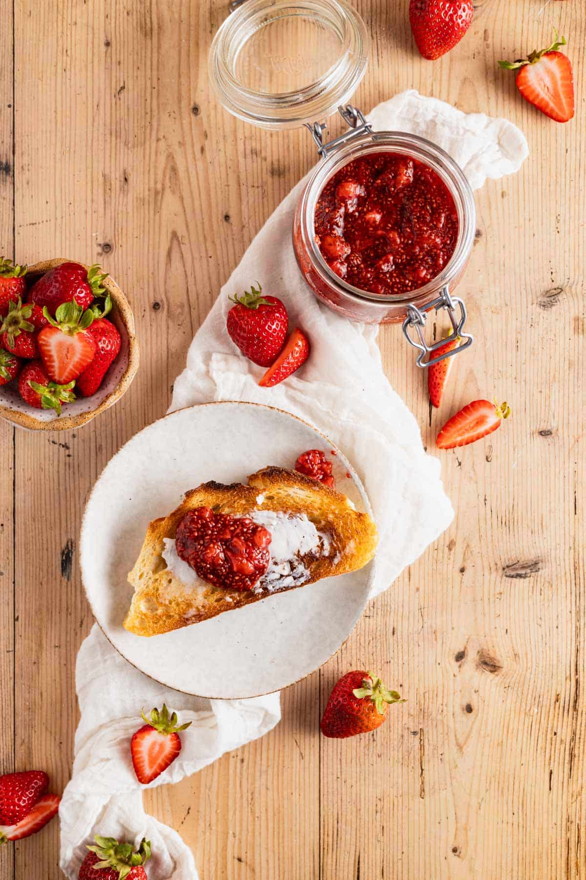 Chia seed berry jam on a piece of toast.