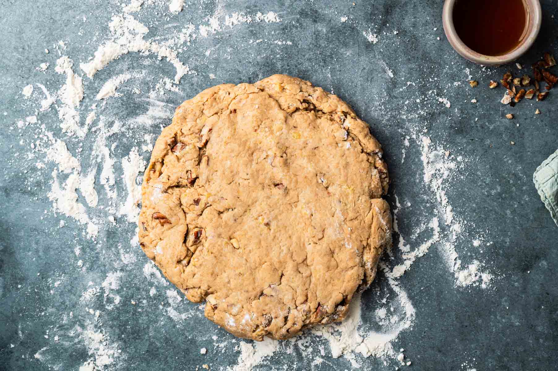 Dough for banana scones fully shaped into a disk.