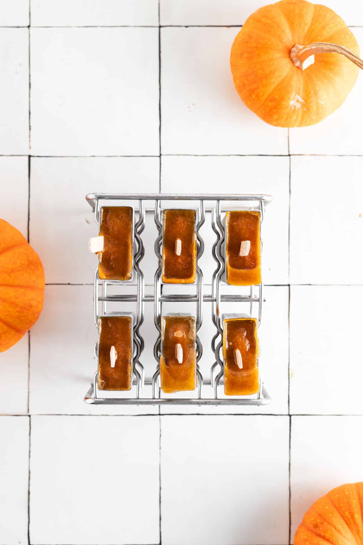 Frozen pumpkin spice popsicles.