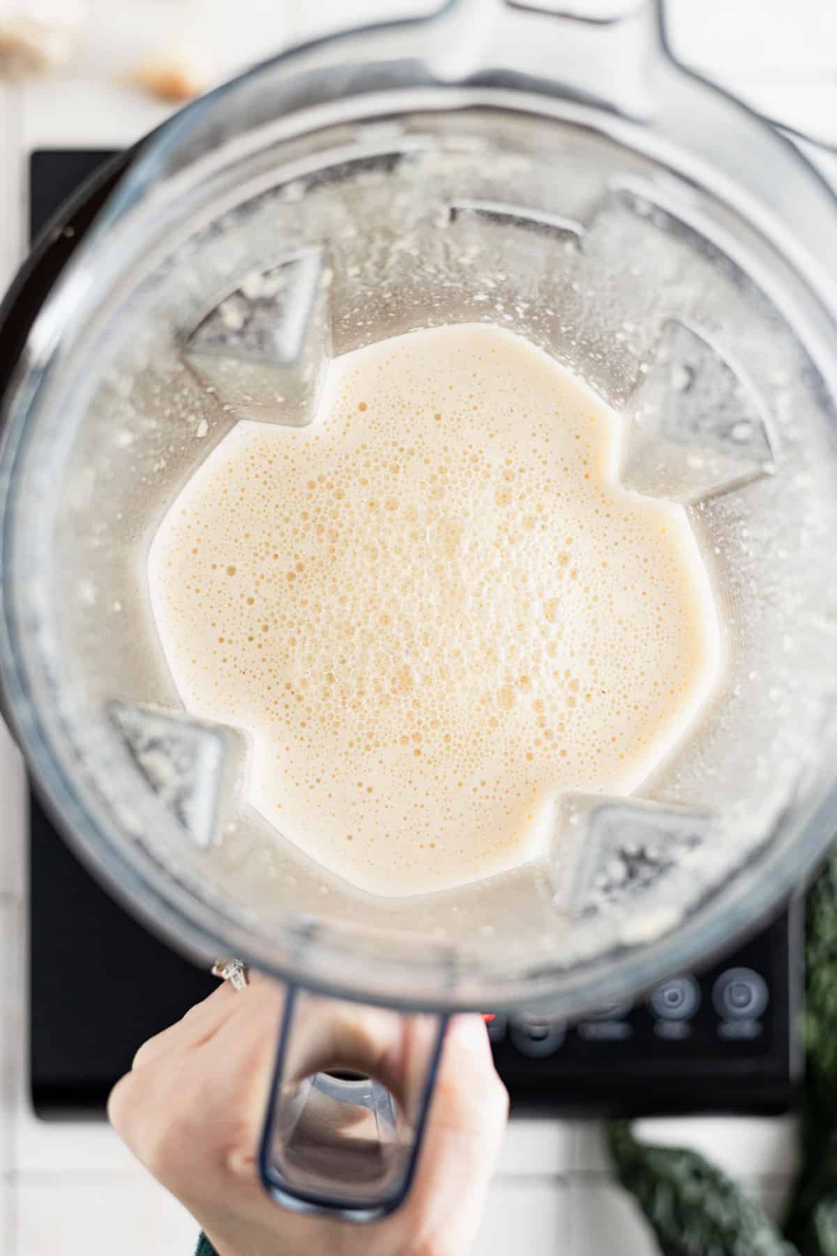 Pureed soup in a blender pitcher.