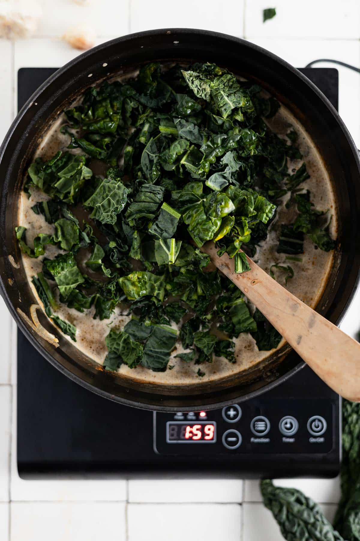 Fresh kale added to the soup.